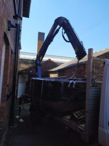 Hot Tub Move - Lifting a hot tub over a garage