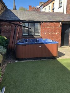 Hot Tub Move - Lifting a hot tub over a garage